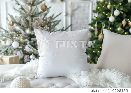 Cozy White Pillow on Fur Blanket with Christmas Tree Lights Background 116108126