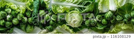 Vibrant Assortment of Fresh Green Vegetables on Light Background 116108129