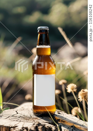 Cold Beer Bottle with Blank Label on Rustic Wooden Surface in Nature Cold Beer Bottle with Blank Label on Rustic Wooden Surface in Nature 116108242