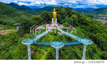 Aerial view of the Pra Yai Phu Khok Ngio or Chiang Khan Skywalk, Loei Province's newest landmark, overlooking the Hueang River flowing through to meet the Mekong River. Aerial view of the Pra Yai Phu Khok Ngio or Chiang Khan Skywalk, Loei Province's newest landmark, overlooking the Hueang River flowing through to meet the Mekong River. 116108870