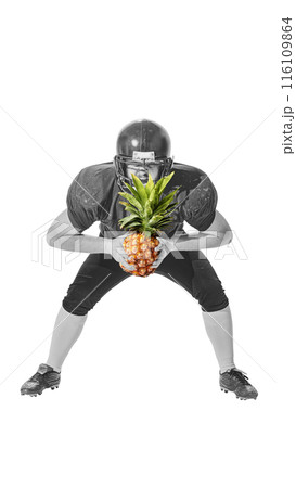 Black and white image of American football player, holding pineapple instead of football ball. Contemporary art collage. 116109864