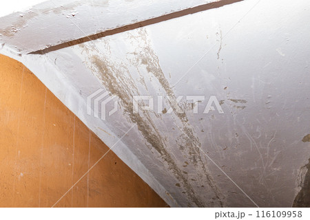 Damage ceiling from water pipelines leakage. Housing problem concept 116109958
