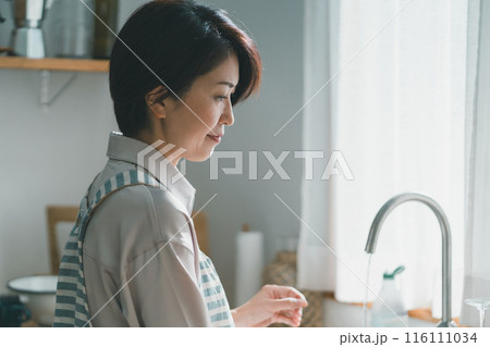 a forty-something woman a forty-something woman 116111034