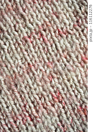 Handmade knitted fabric grey and red wool background texture 116112276