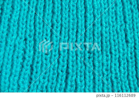Handmade knitted fabric blue wool background texture 116112689