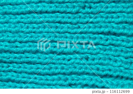 Handmade knitted fabric blue wool background texture 116112699