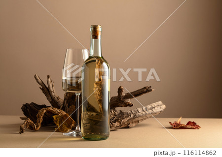 White wine and snags on a beige background. 116114862