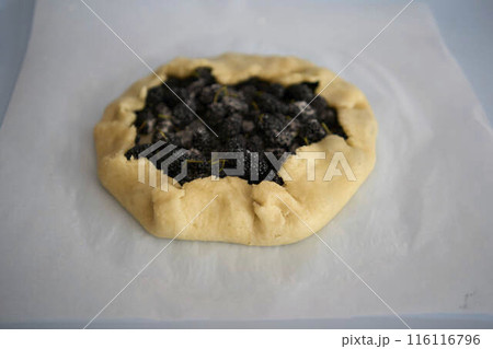 the process of making galette pie with mulberry the process of making galette pie with mulberry 116116796