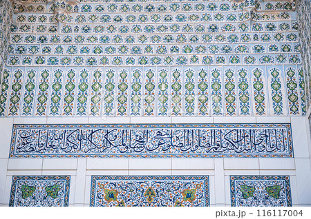 Uzbek ceramic tile decor with oriental Arabic patterns and ornaments on portal of Minor Mosque in Tashkent in Uzbekistan Uzbek ceramic tile decor with oriental Arabic patterns and ornaments on portal of Minor Mosque in Tashkent in Uzbekistan 116117004