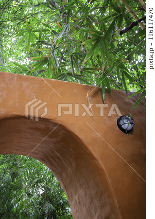 A coffee shop terrace with tables and chairs A coffee shop terrace with tables and chairs 116117470