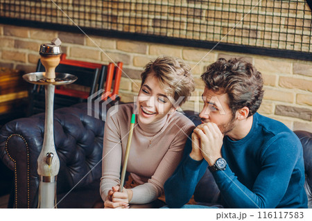 young positive people habing fun at the restaurant 116117583