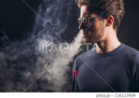 cool guy with smoke from nose 116117604