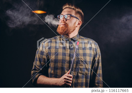 red-haired brutal man etting pleasure from smoking red-haired brutal man etting pleasure from smoking 116117665