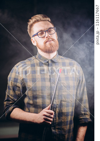 confident cool man in fashion shirt with hookah 116117667