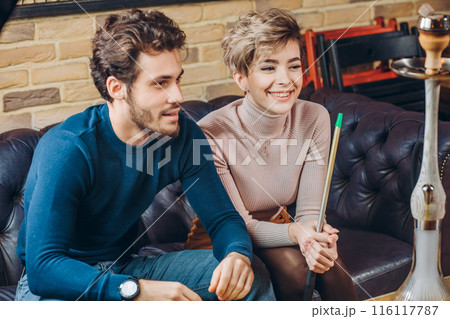 positive two people are spending weekend at the cafe 116117787