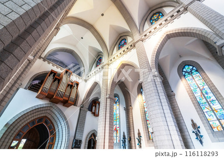 interior inside of Christian Catholic church with organ pipes on the wall. Sacred Heart of Jesus Cathedral in Tashkent in Uzbekistan interior inside of Christian Catholic church with organ pipes on the wall. Sacred Heart of Jesus Cathedral in Tashkent in Uzbekistan 116118293
