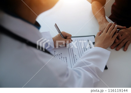 Female doctors shake hands with patients encouraging each other To offer love, concern, and encouragement while checking the patient's health. Concept Health care and Social Security 116119144