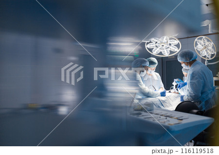 Blurred background with team surgeon at work in operating room 116119518
