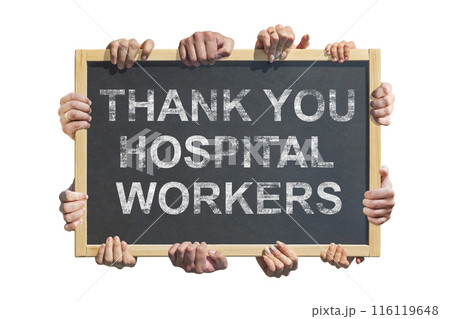 A lot of hands are holding a poster with the inscription " Thank you hospital workers " . Concept of gratitude to medical workers during the coronavirus pandemic 116119648