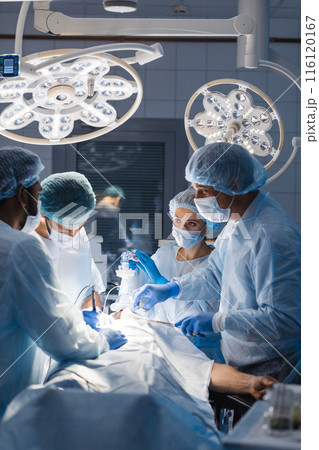 Surgeons perform a complex operation to save a human life at hospital 116120167