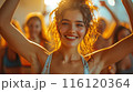 Smiling Woman Dancing at a Nightclub 116120364