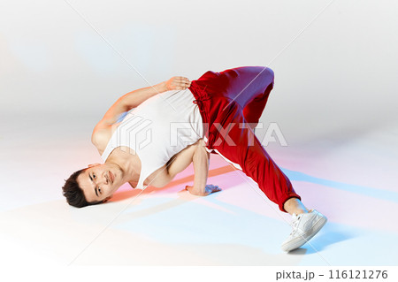 Korean breakdancer performing Air Chair element of downrock breakdance. Korean breakdancer performing Air Chair element of downrock breakdance. 116121276