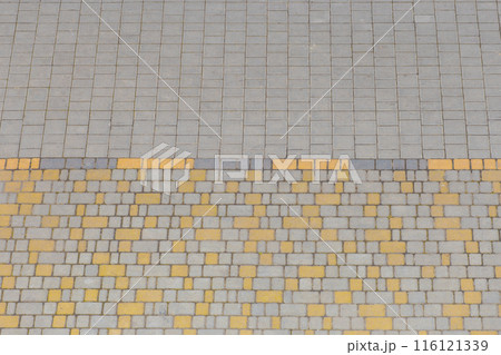 Gray yellow color floor tile stone texture surface street city background road pattern 116121339