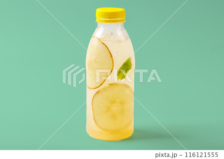 Duchess lemonade with pear, mint, pear syrup, ice, sparkling water on green background for food delivery website 1 116121555