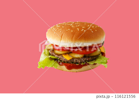 hamburger like in McDonald's with a beef cutlet on a red background, studio shooting 3 116121556