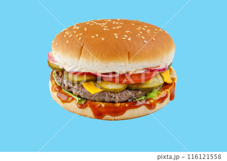 hamburger like in McDonald's with a beef cutlet on a blue background, studio shooting 1 116121558