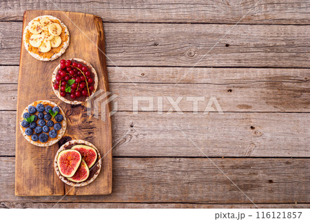 Protein toast crispbread with delicious toppings top view Protein toast crispbread with delicious toppings top view 116121857