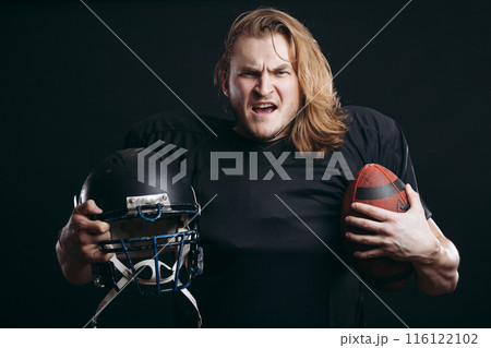 Rugby football player, with long hair over isolated background Rugby football player, with long hair over isolated background 116122102