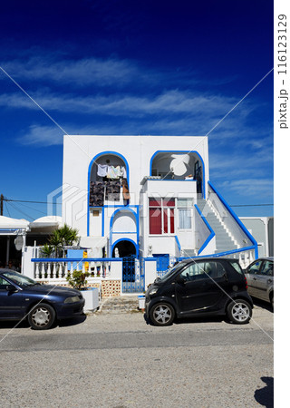 The traditional building and Smart fortwo car, Fira, Greece. 116123129