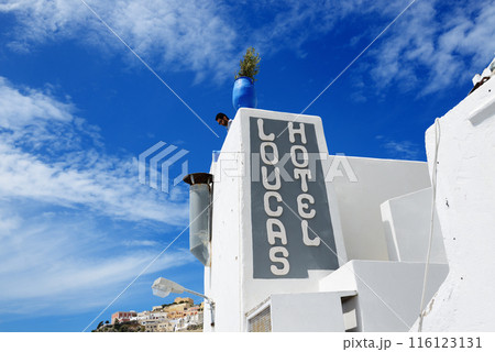 The hotel Loucas building and tourist is on terrace, Fira, Greece 116123131