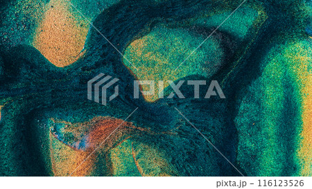 A green and brown abstract painting with a lot of texture 116123526