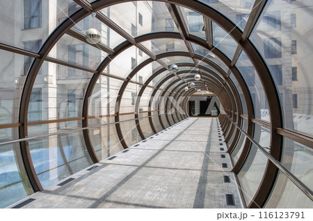 Foofbridge tunel made from piles and glass with abstract design. Foofbridge tunel made from piles and glass with abstract design. 116123791