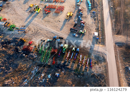 Aerial View of Construction Site With Trucks and Machinery Aerial View of Construction Site With Trucks and Machinery 116124279