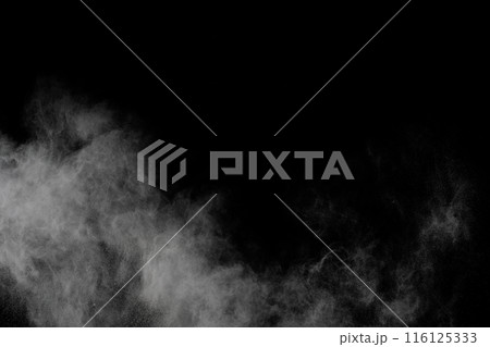 White powder on black background 116125333