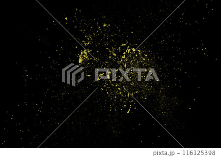 Golden powder explosion on black background. Freeze motion. 116125398