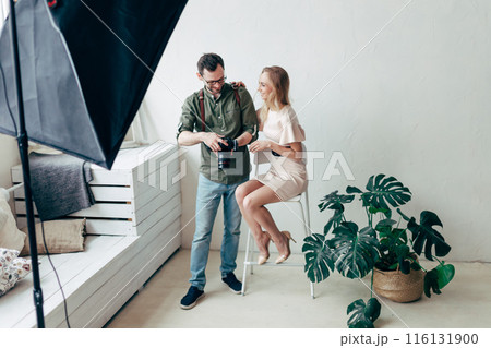 young cool girl rejoicing at good photos 116131900