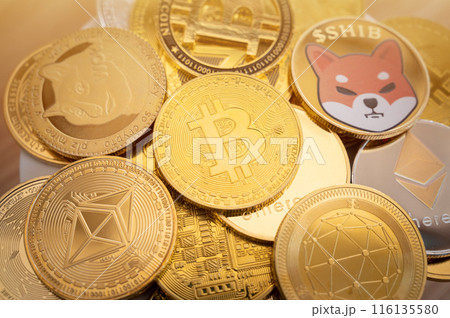 Close up of various kinds of cryptocurrency token coins. Cryptocurrency is a digital or virtual currency that is secured by cryptography. 116135580