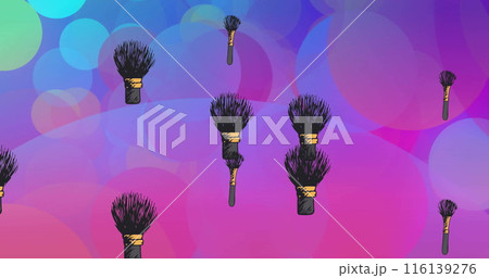 Image of makeup powder brushes over blue and pink light spots Image of makeup powder brushes over blue and pink light spots 116139276