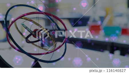 Image of network of connection with interface icons over model of atom moving in laboratory 116140827