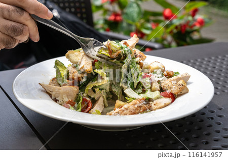 Caesar Salad, Green Lettuce Salat with Chicken and Parmesan Cheese Closeup 116141957