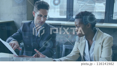 White male leader & Black female junior chat on graphs 116141982
