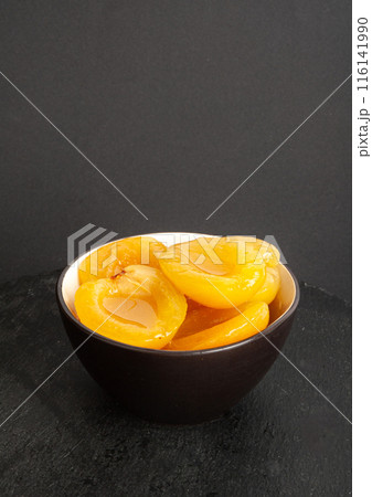 Canned Peaches, Apricot Halves in Syrup, Yellow Fruit Dessert, Tinned Nectarine Compote Canned Peaches, Apricot Halves in Syrup, Yellow Fruit Dessert, Tinned Nectarine Compote 116141990