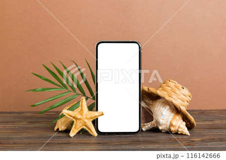 Smartphone mock up template with summer objects. Perspective view with copy space for text Smartphone mock up template with summer objects. Perspective view with copy space for text 116142666