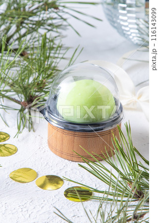 Mochi dessert. Green cake with cream filling. Pear and cheese. Mochi dessert. Green cake with cream filling. Pear and cheese. 116143099