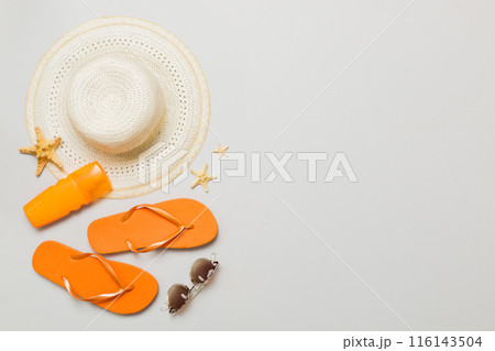 Top view travel or vacation concept. Composition with stylish beach accessories on colored background, top view. Beach fashion flat lay, summer concept. Trendy colors 116143504