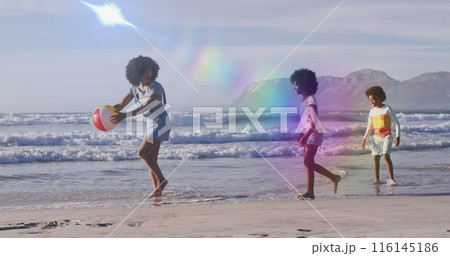 Image of light trails over african american family at beach Image of light trails over african american family at beach 116145186